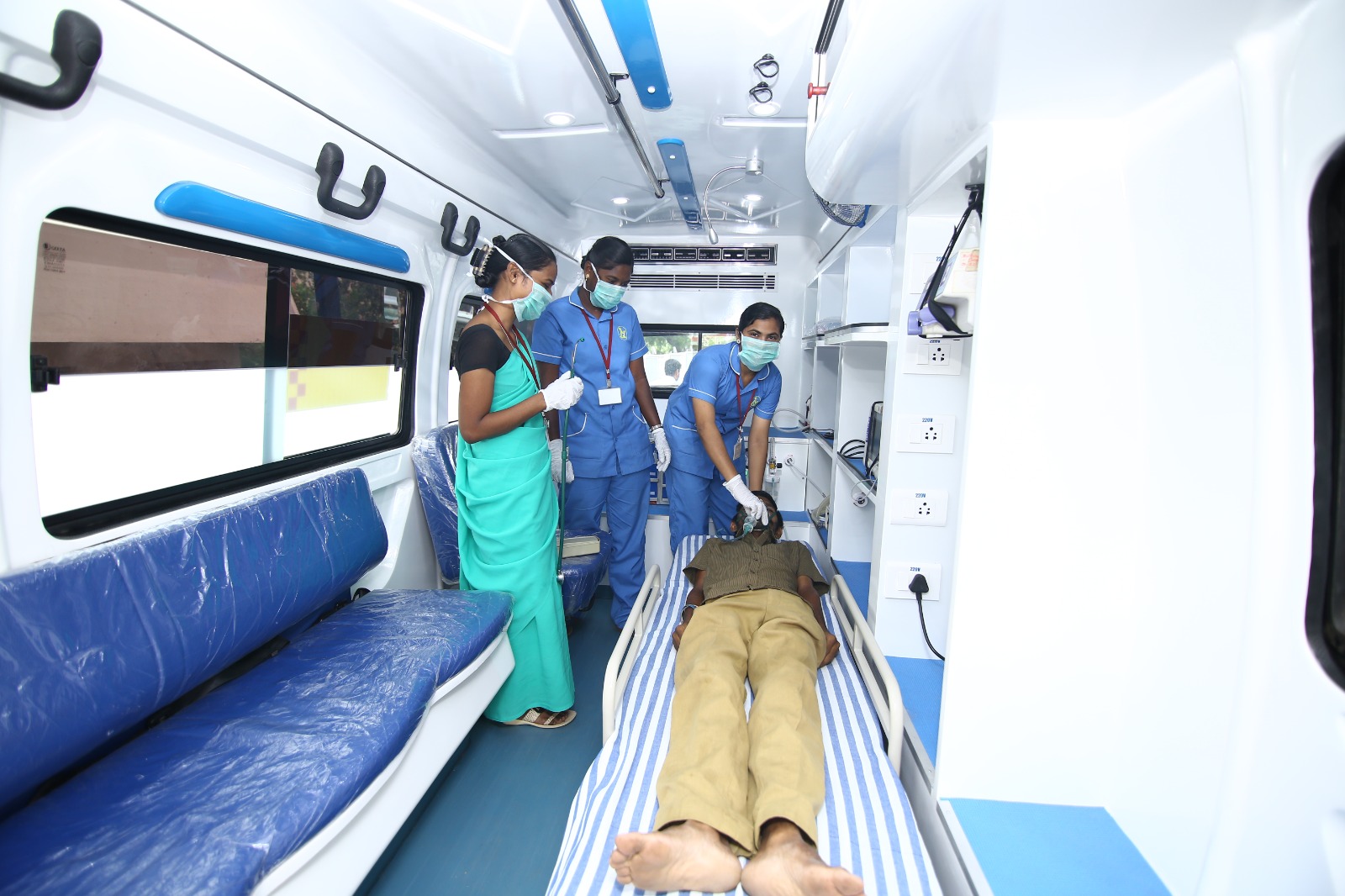 Patient receiving care inside ambulance